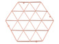 Un dessous de plat hexagonal rose doré.