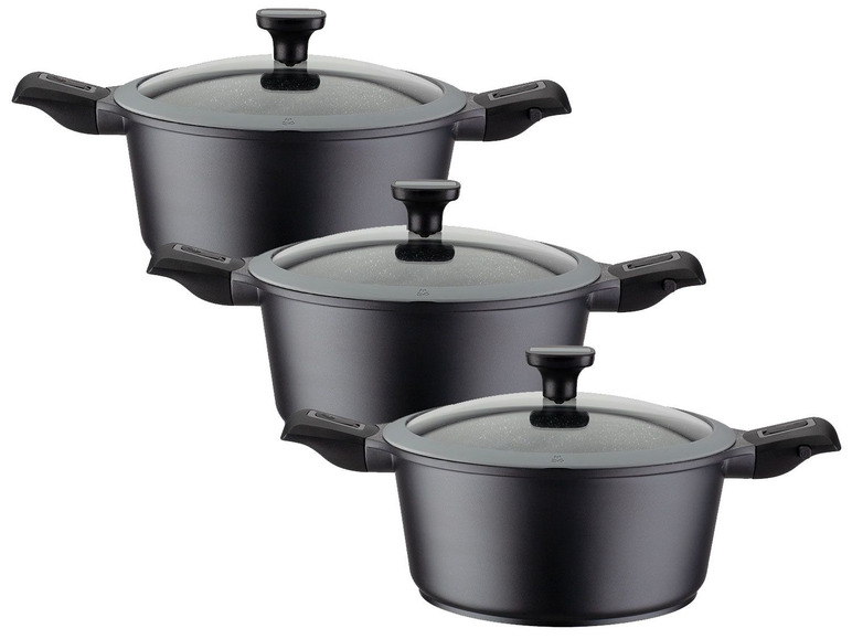 Trois casseroles avec couvercles en verre.