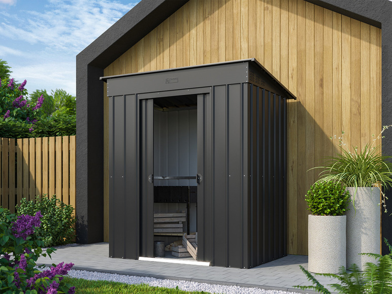 Un abri de jardin en métal noir avec des portes coulissantes.