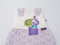 Une gigoteuse violette à motif chat de Träumeland.