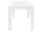 Table à manger blanche au design moderne.
