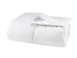 Une couette blanche en duvet de Hästens.
