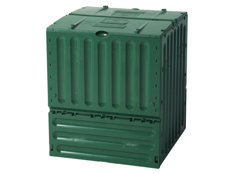 Un composteur en plastique vert.