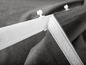 Toile de tente grise avec fermeture velcro blanche