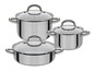 Un ensemble de trois casseroles en acier inoxydable avec couvercles en verre.
