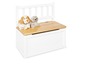 Banc de rangement blanc avec siège en bois et jouets.