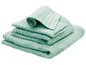 Une pile de serviettes moelleuses de couleur vert menthe.