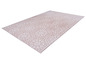 Un tapis rose avec un motif géométrique blanc.