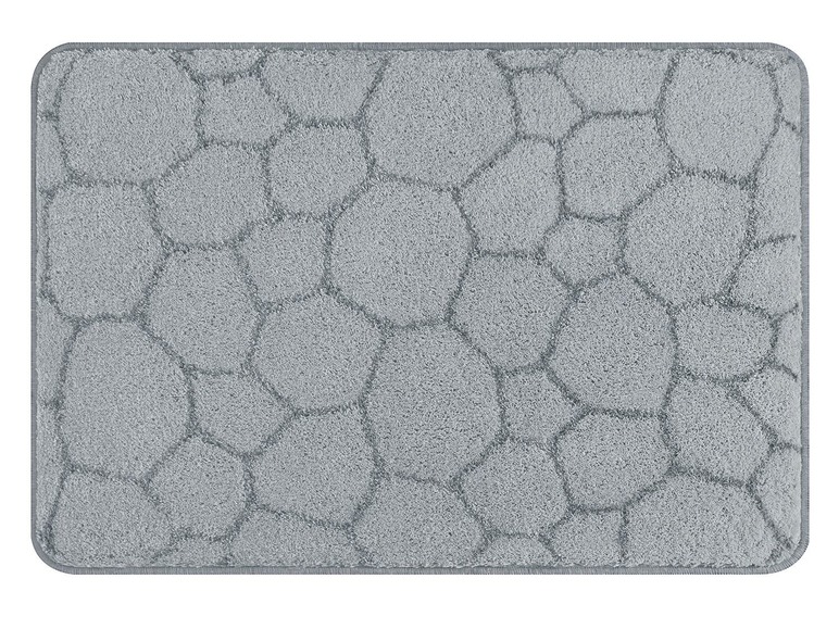 Un tapis gris avec un motif de pierre.
