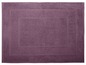 Un tapis de bain violet avec un bord cousu.