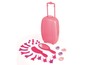 Une valise rose avec des accessoires pour cheveux en jouet, dont un peigne, un miroir et des pinces à cheveux.