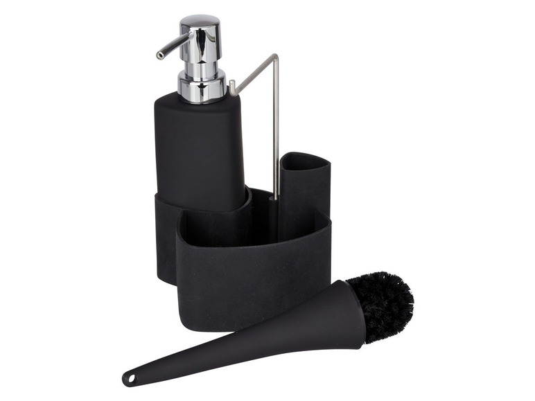 Distributeur, brosse et support noirs pour produits de nettoyage.