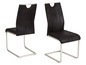 Deux chaises de salle à manger noires avec une structure en acier.