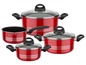 Un ensemble de casseroles rouges avec des couvercles en verre.