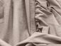 Draps beige avec élastique.