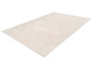 Un tapis beige avec un motif géométrique.