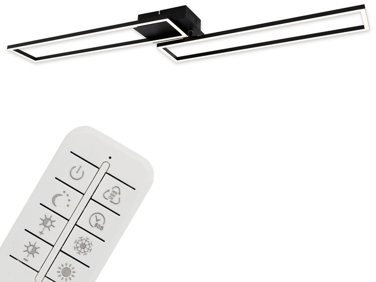 Un luminaire de plafond noir avec deux lumières carrées et une télécommande blanche.