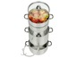 Une presse à jus en acier avec des pommes pour faire du cidre de pomme.