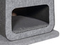 Une maison pour chat grise avec un coussin