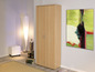 Une armoire en bois avec deux portes dans une pièce claire.