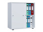 Une armoire blanche avec des portes coulissantes, remplie de dossiers bleus, verts et rouges.