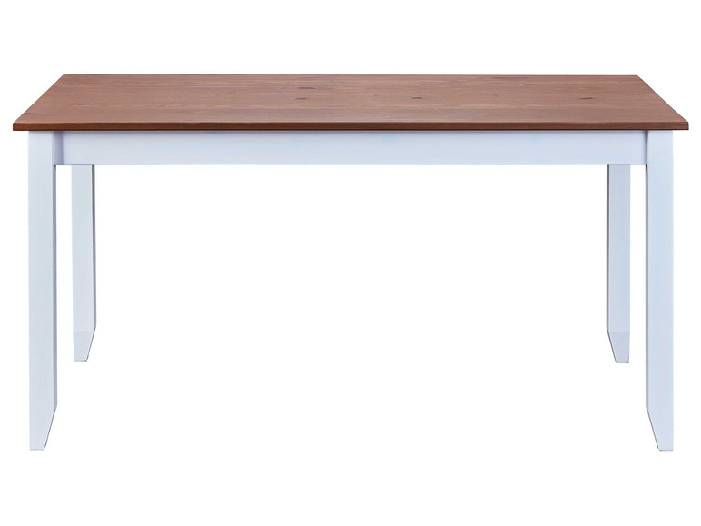 Une table à manger blanche avec un plateau en bois.