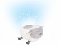 Un mouton en peluche avec un projecteur d'étoiles.
