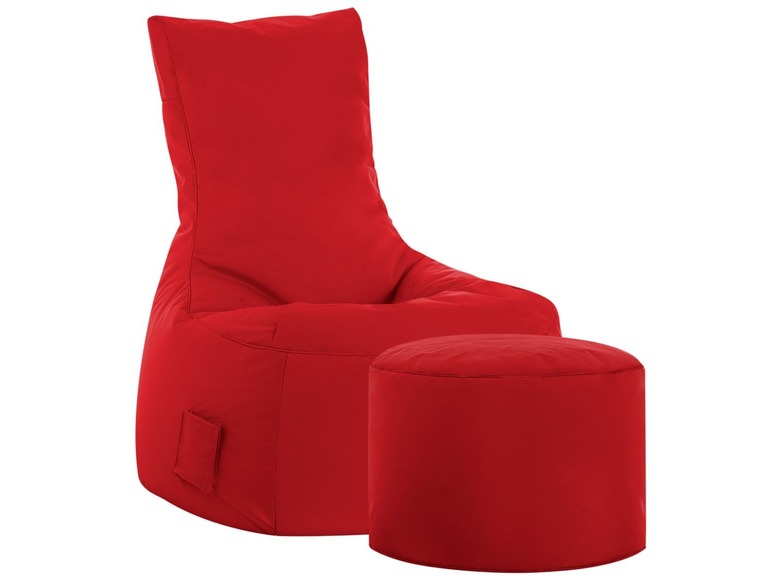 Un fauteuil rouge avec un repose-pieds assorti.