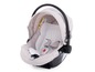 Un siège auto Chicco beige avec un appui-tête et un système de ceinture.