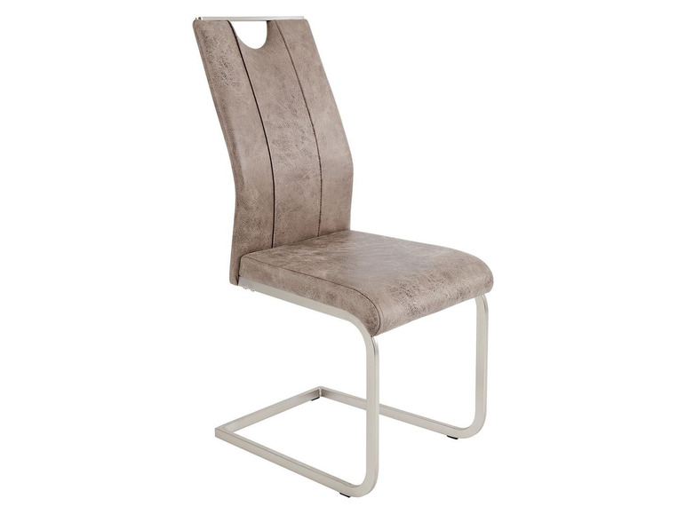 Une chaise de salle à manger de couleur beige clair avec un piétement en métal.