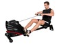 Un homme utilise un rameur Christopeit Sport Lago.