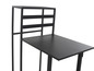Un bureau en métal noir avec un plateau coulissant et une grille sur le dessus.