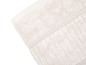 Une serviette beige de près