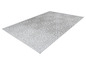 Un tapis gris avec un motif géométrique.