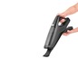 Un aspirateur à main Grundig avec une brosse.