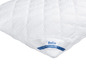 Un oreiller blanc matelassé de BeCo.