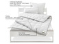 Une couette et des oreillers Fjodur garnis de 80% duvet et 20% plumes.