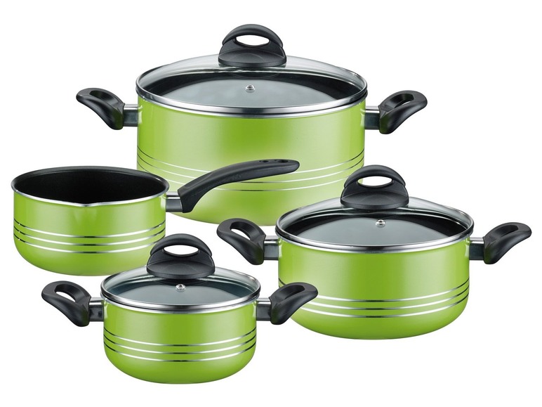 Un ensemble de quatre casseroles vertes avec couvercles en verre.