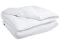 Couette blanche pliée.