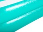 Détail d'une piscine gonflable turquoise.