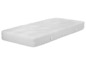 Un matelas blanc avec une texture ondulée.