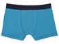 Boxer bleu avec une ceinture bleu marine.