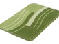 Tapis de bain vert avec un motif ondulé.
