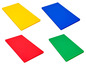 Quatre planches à découper colorées : jaune, bleu, rouge et vert.