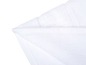 Serviettes en éponge blanches pliées