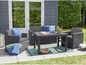Ensemble de jardin avec deux chaises et une table de style rotin.