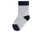 Une chaussette grise avec des accents bleus.