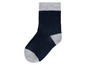 Une chaussette bleu foncé avec des accents gris.
