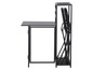 Une table noire avec un rangement pour chaises pliantes.