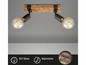 Plafonnier deux lumières avec base en bois et bras réglables.